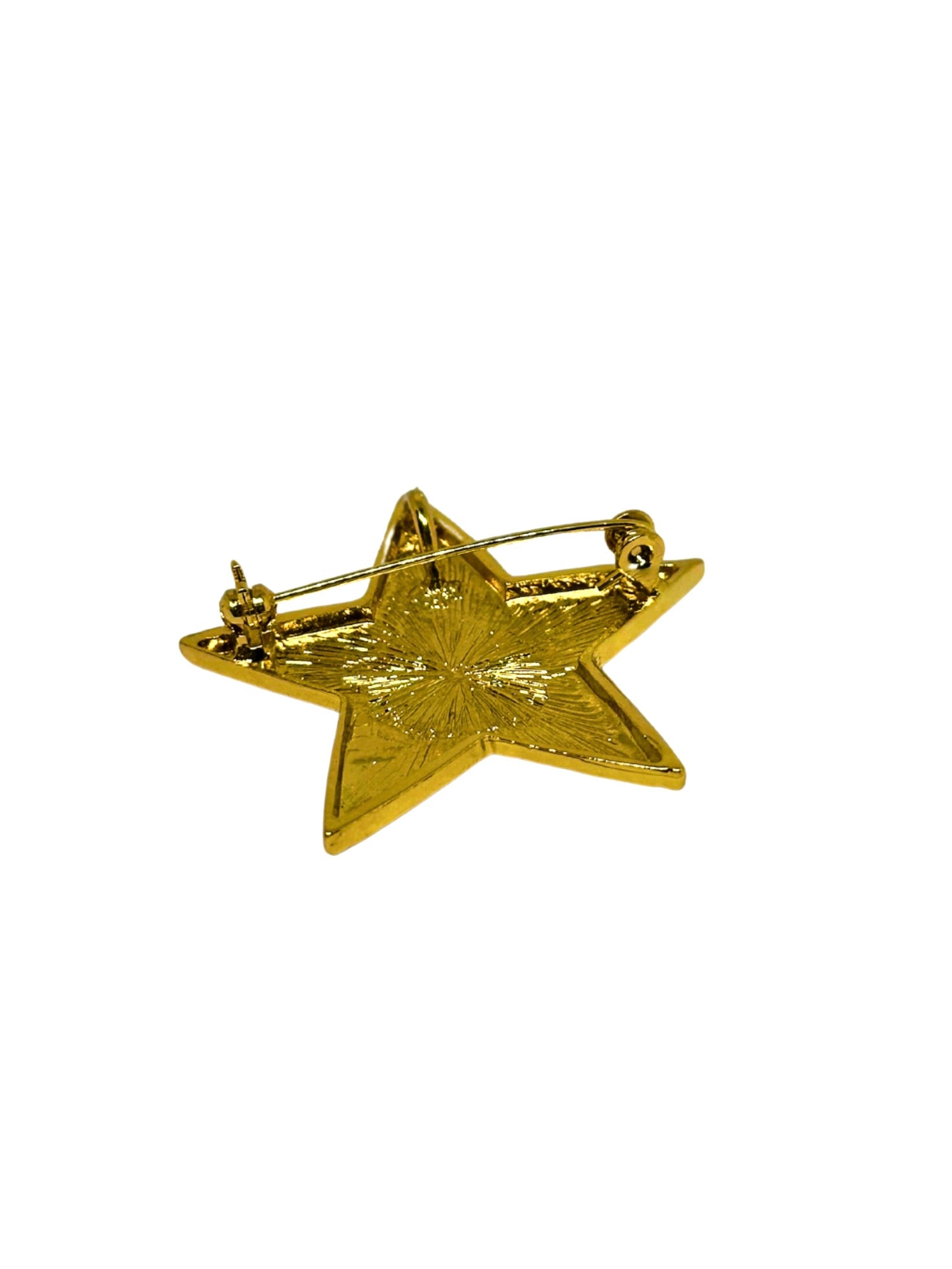 Broche de estrella dorada de flamenca detalles