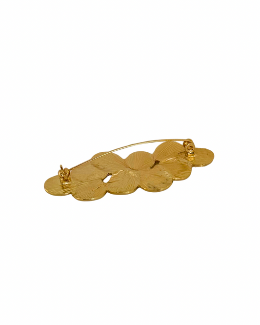 Broche de petalos dorados de flamenca detalles