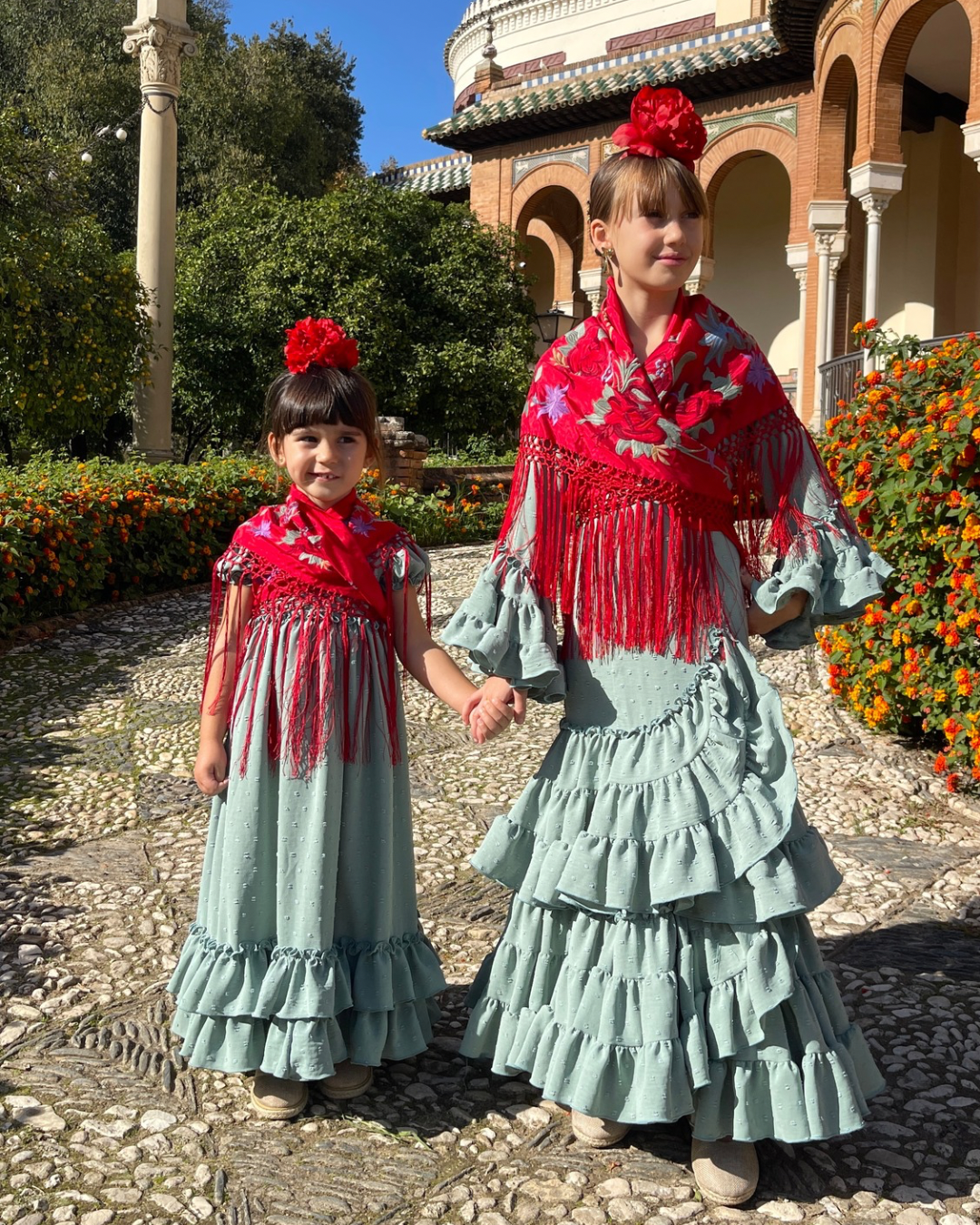 Vestido de flamenca de plumeti de color jabonoso para niña