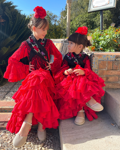 Vestido de flamenca de plumeti de color rojo para niña