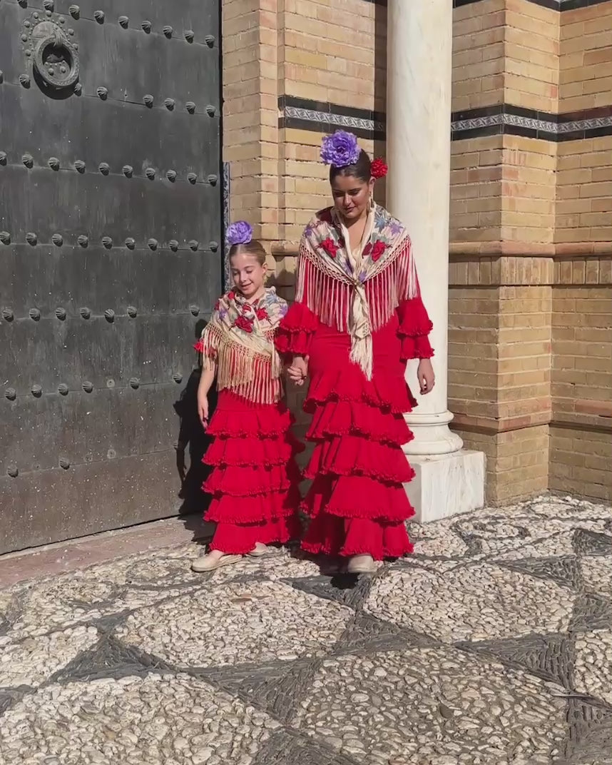 Traje tradicional de flamenca para niña de volantes rojo